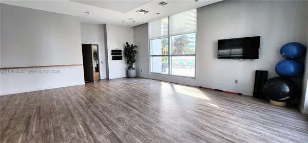 a view of a room with gym equipment