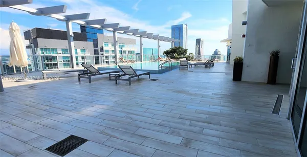 a view of a balcony with city view