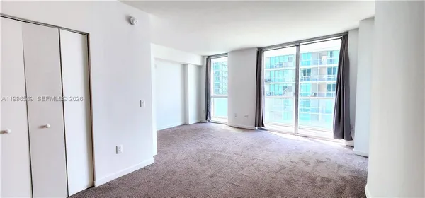 a view of a room with an empty space