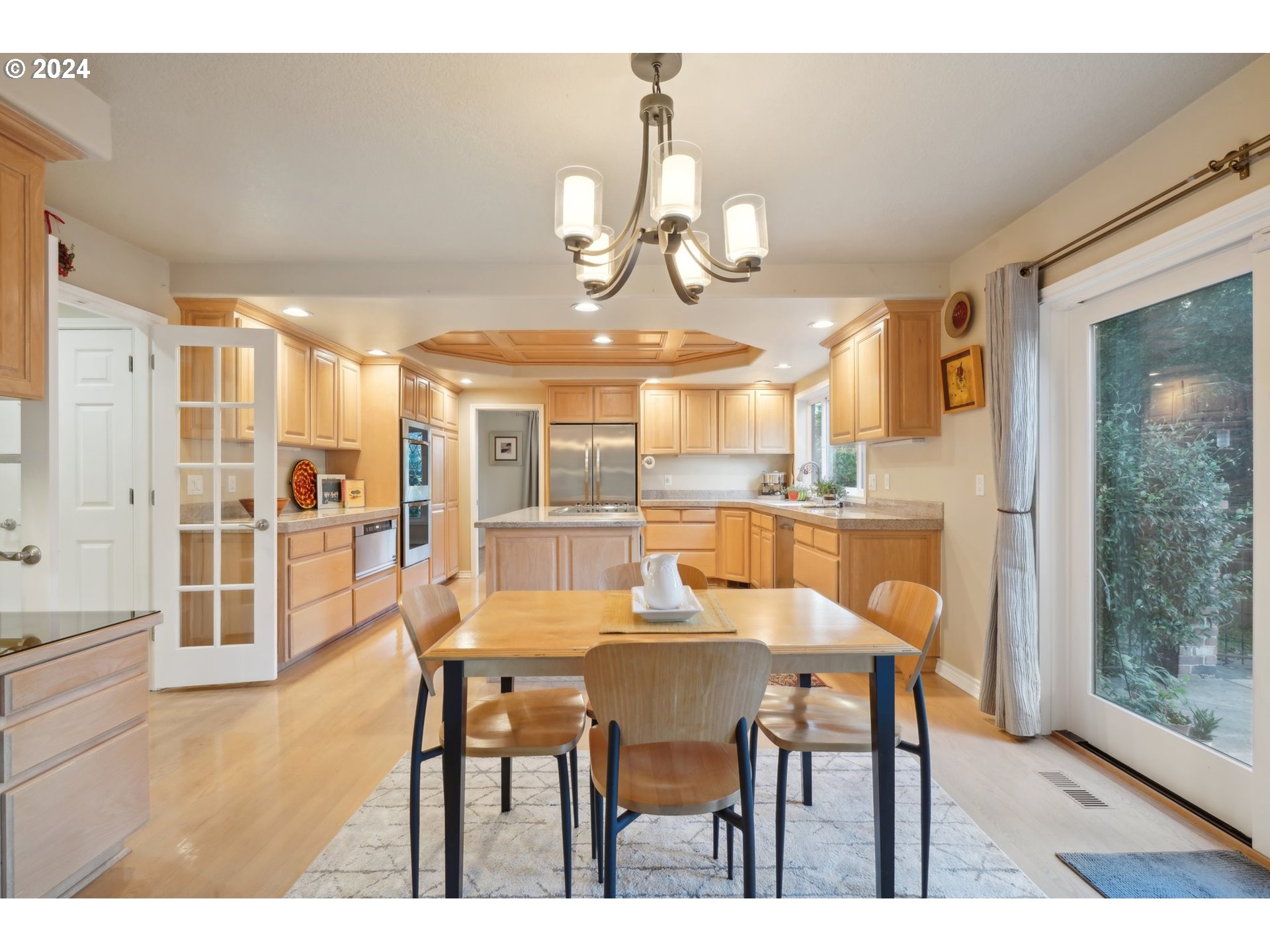 8121 Northeast 71st Loop Vancouver, WA 98662 - Photo 11 of 44 a view of a dining room with furniture and wooden floor