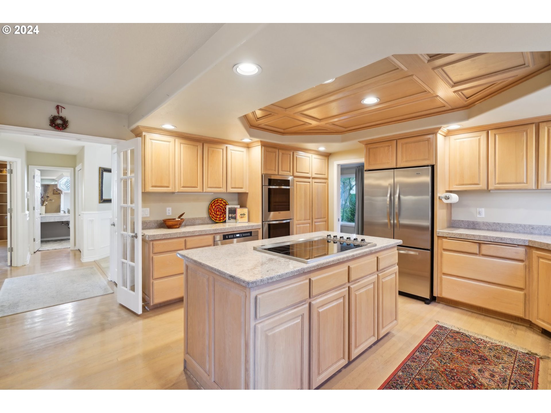 8121 Northeast 71st Loop Vancouver, WA 98662 - Photo 13 of 44 a kitchen with a sink stove and refrigerator