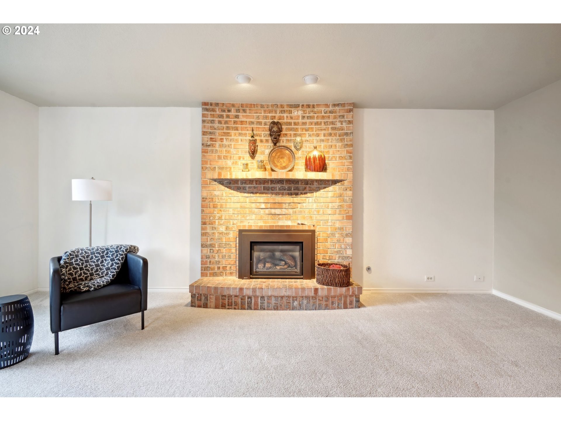 8121 Northeast 71st Loop Vancouver, WA 98662 - Photo 14 of 44 a living room with furniture and a fireplace