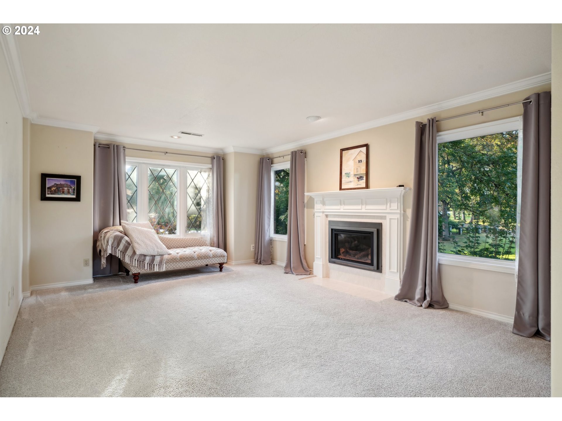 8121 Northeast 71st Loop Vancouver, WA 98662 - Photo 22 of 44 a view of a livingroom with furniture a fireplace and windows