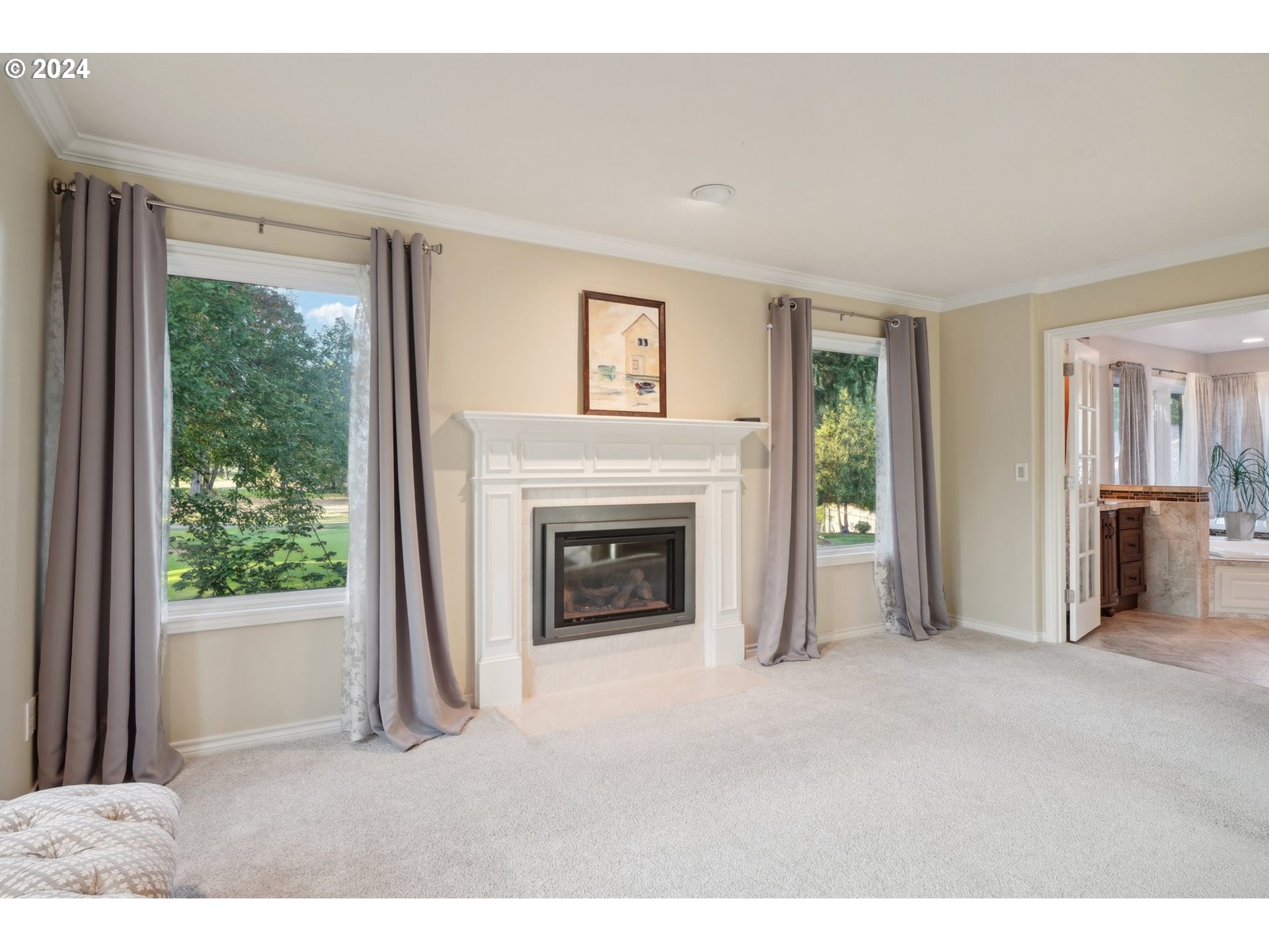 8121 Northeast 71st Loop Vancouver, WA 98662 - Photo 23 of 44 a view of a livingroom with an empty space and a fireplace