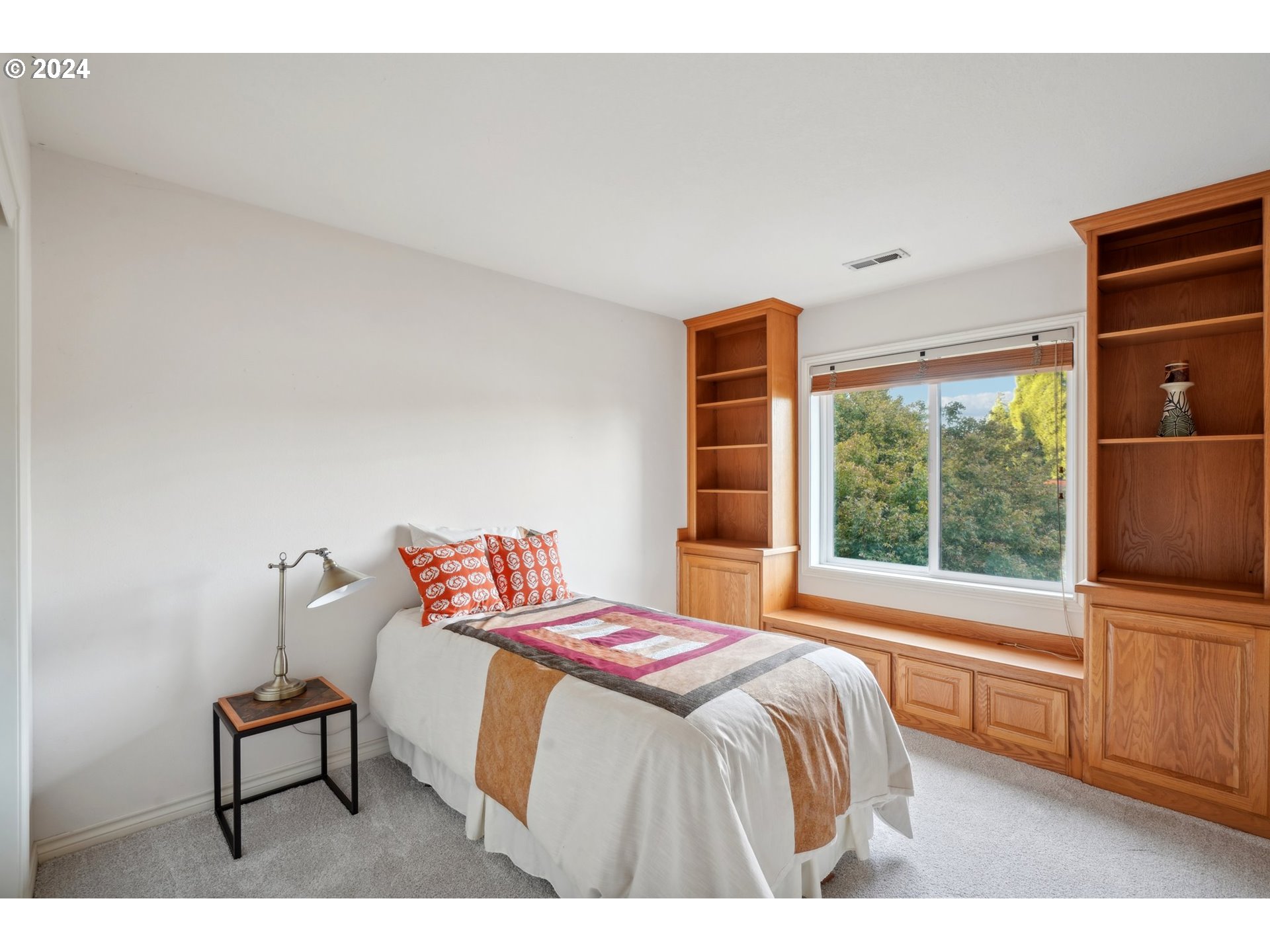 8121 Northeast 71st Loop Vancouver, WA 98662 - Photo 30 of 44 a bedroom with a bed and a large window