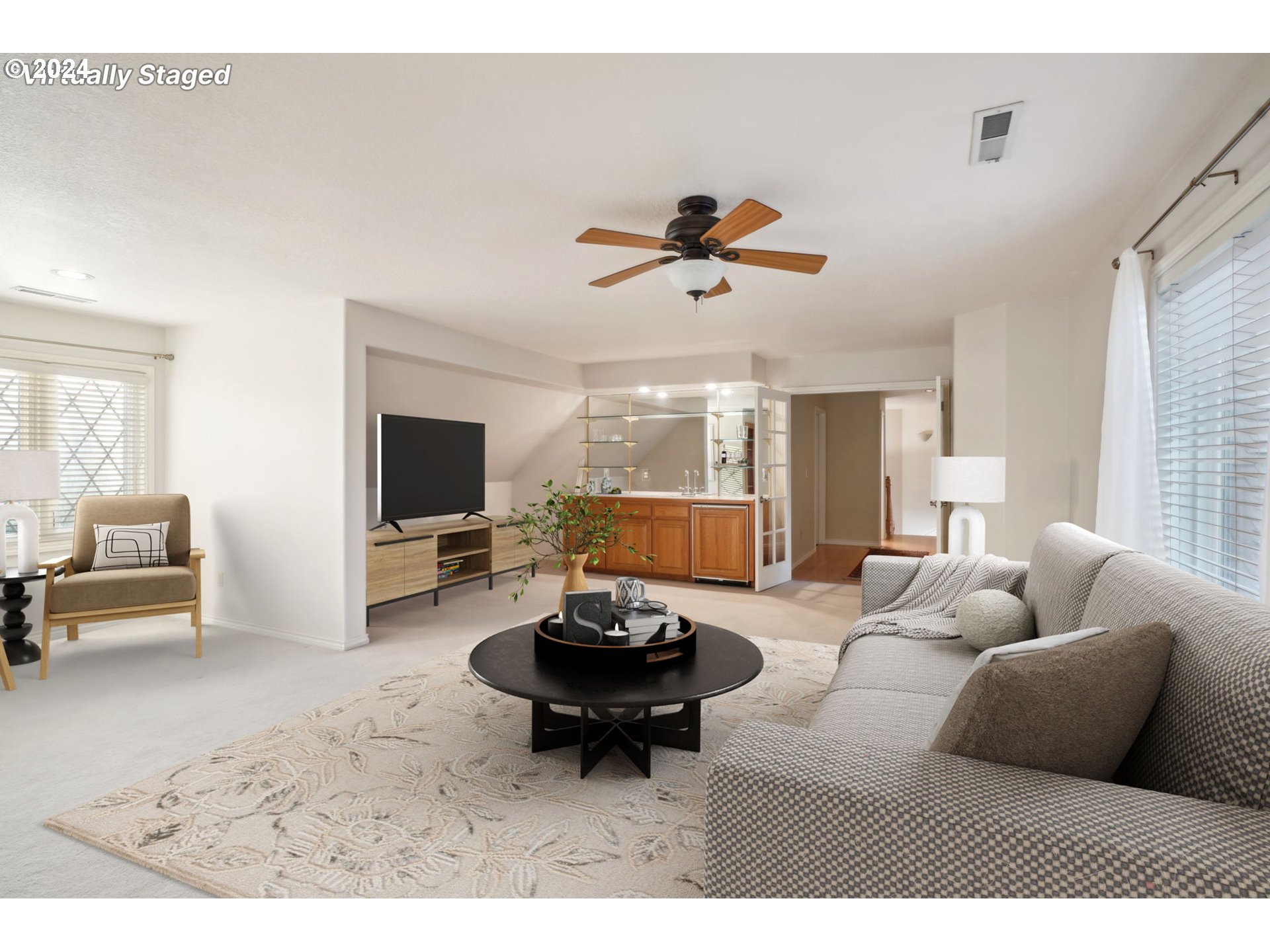 8121 Northeast 71st Loop Vancouver, WA 98662 - Photo 34 of 44 a living room with furniture and a flat screen tv