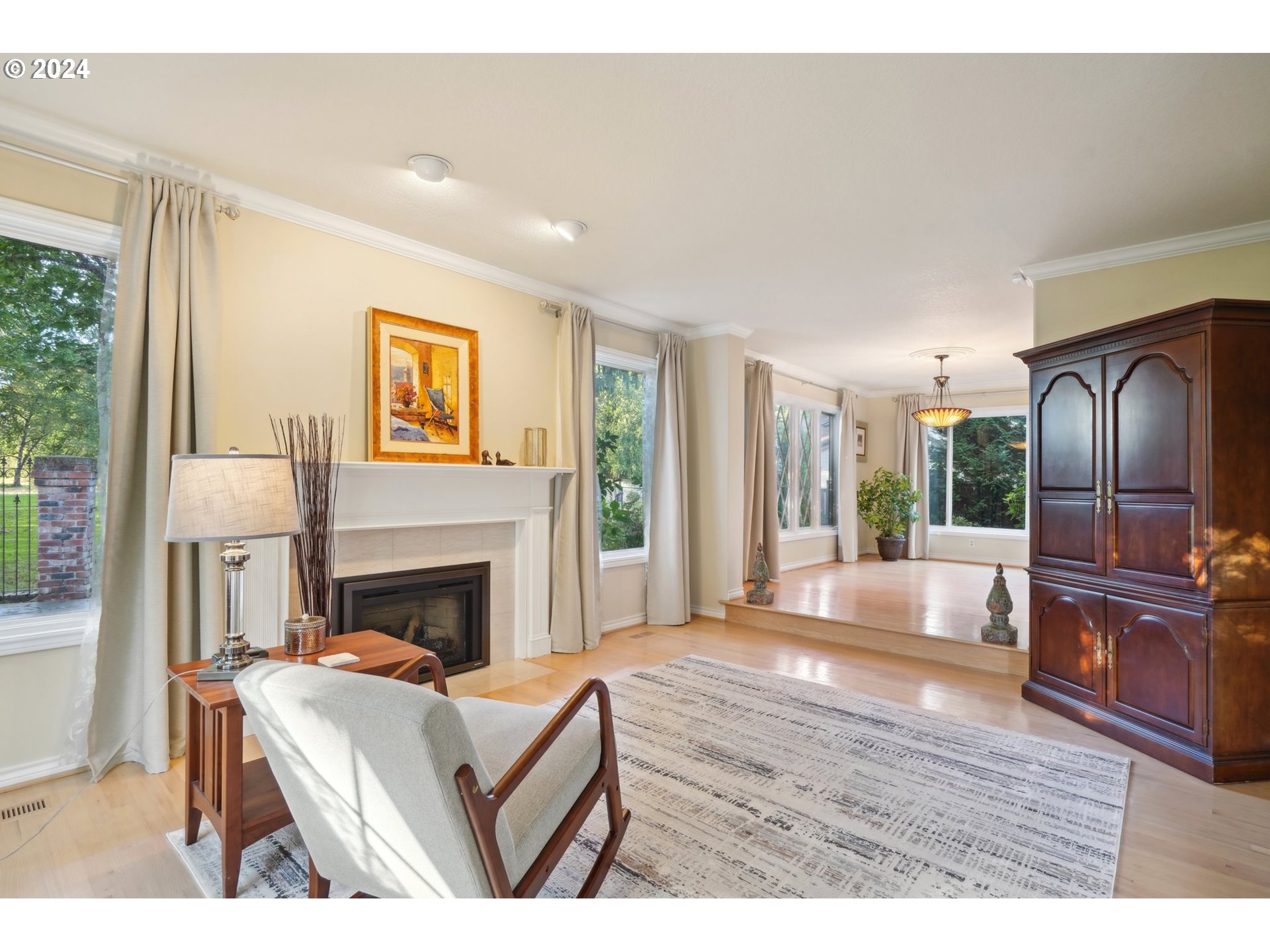 8121 Northeast 71st Loop Vancouver, WA 98662 - Photo 6 of 44 a living room with furniture and a fireplace