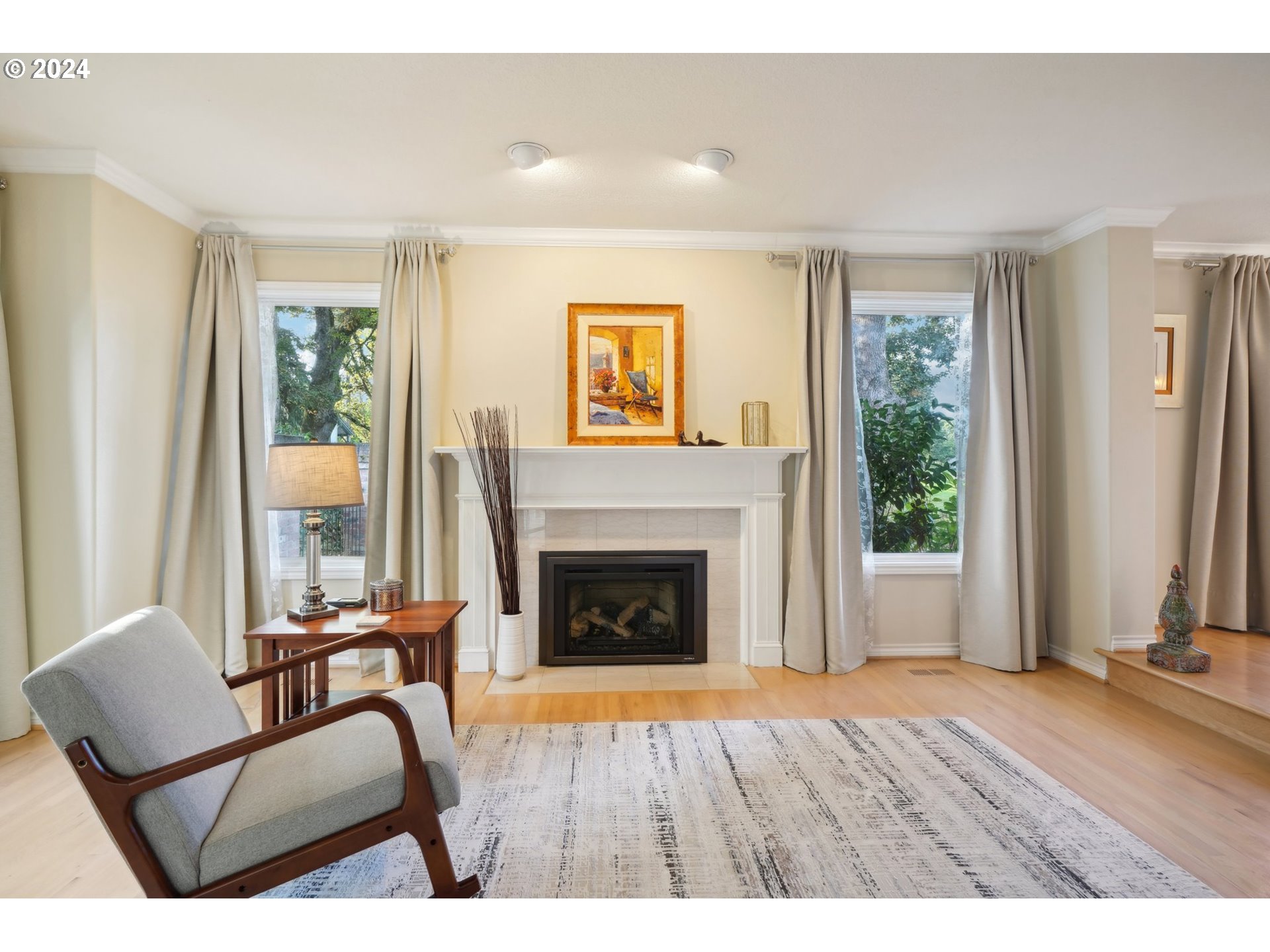 8121 Northeast 71st Loop Vancouver, WA 98662 - Photo 7 of 44 a living room with furniture and a fireplace