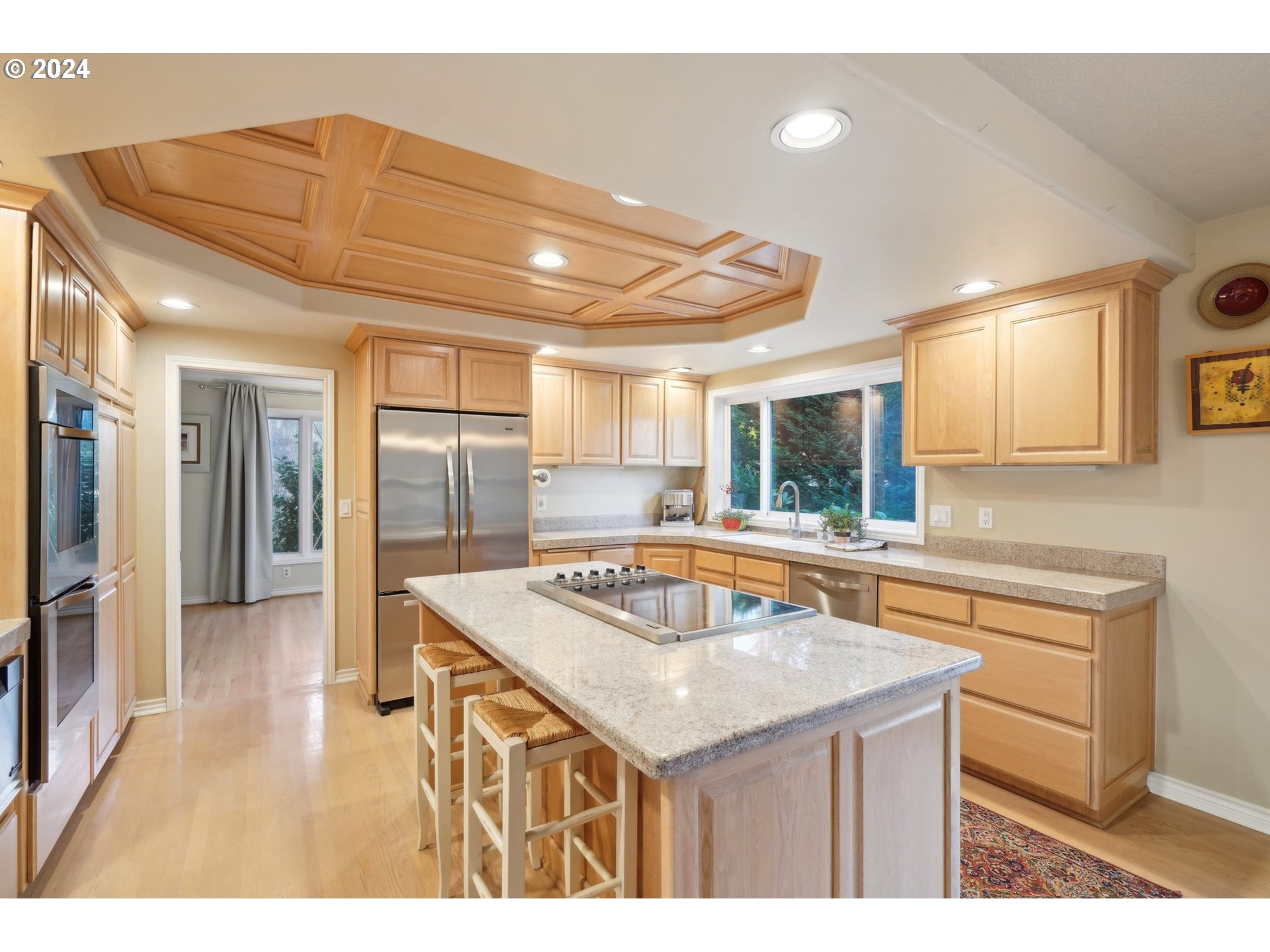 8121 Northeast 71st Loop Vancouver, WA 98662 - Photo 10 of 44 a kitchen with a sink refrigerator and cabinets