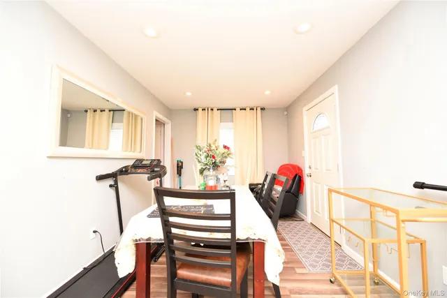 a view of a living room and dining room