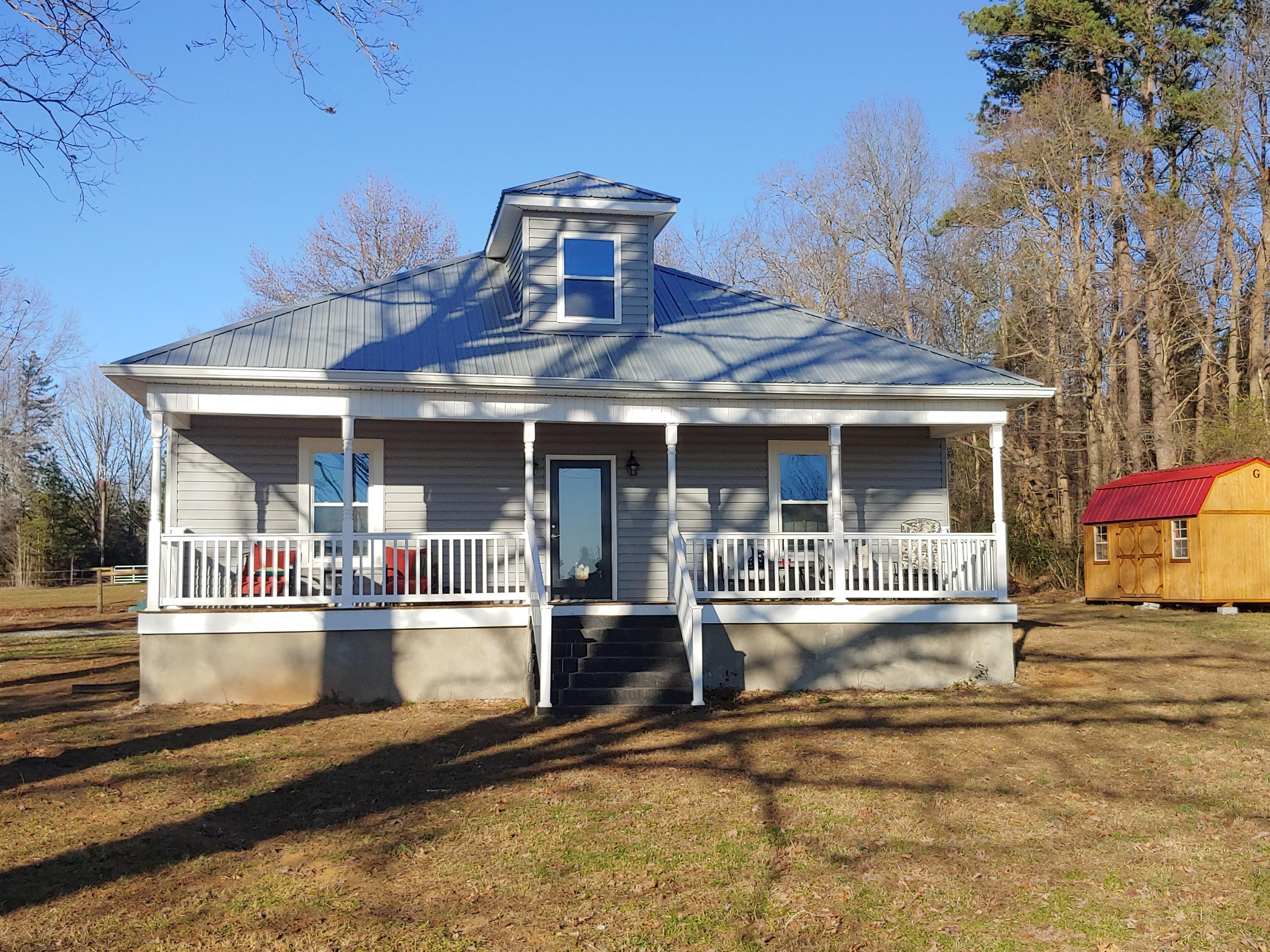 1016 Lacks Town Road Clover, VA 24534 - Photo 1 of 30 front view of a house with a porch