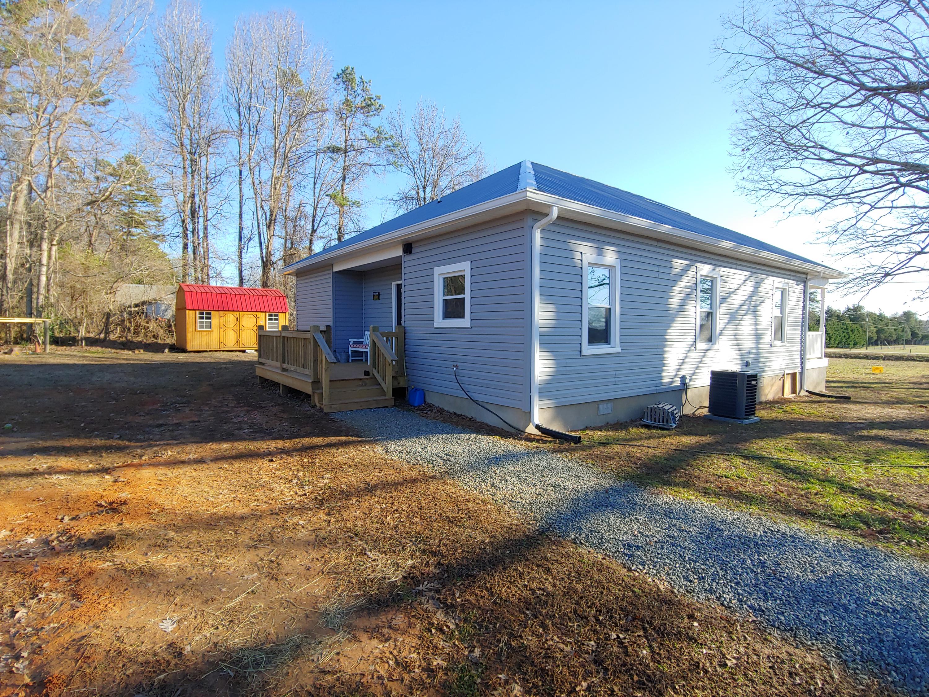 1016 Lacks Town Road Clover, VA 24534 - Photo 11 of 30 a view of a house with a yard
