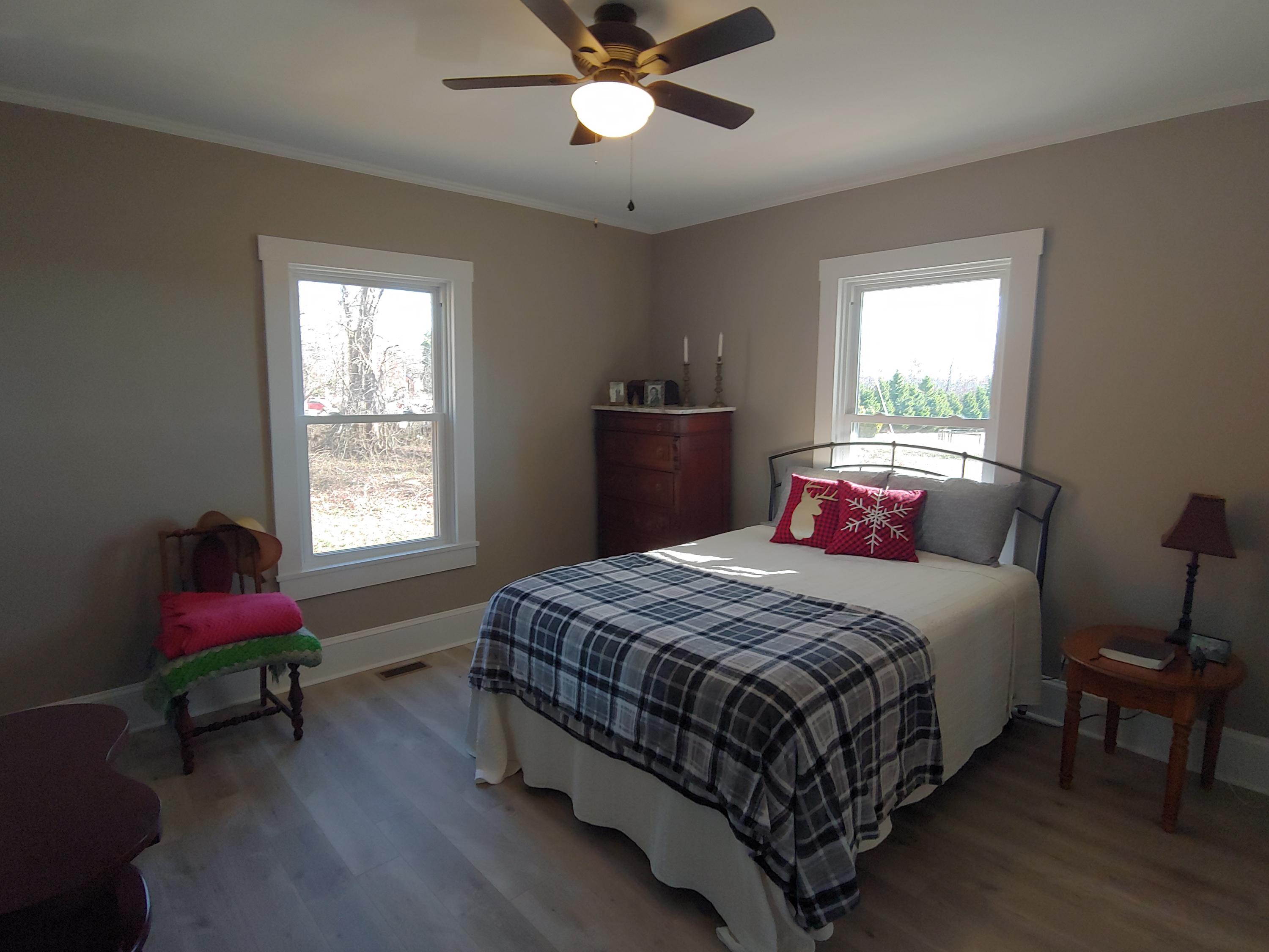 1016 Lacks Town Road Clover, VA 24534 - Photo 6 of 30 a bed room with a bed and a window