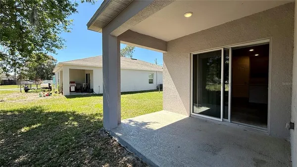 a view of an outdoor space and a house