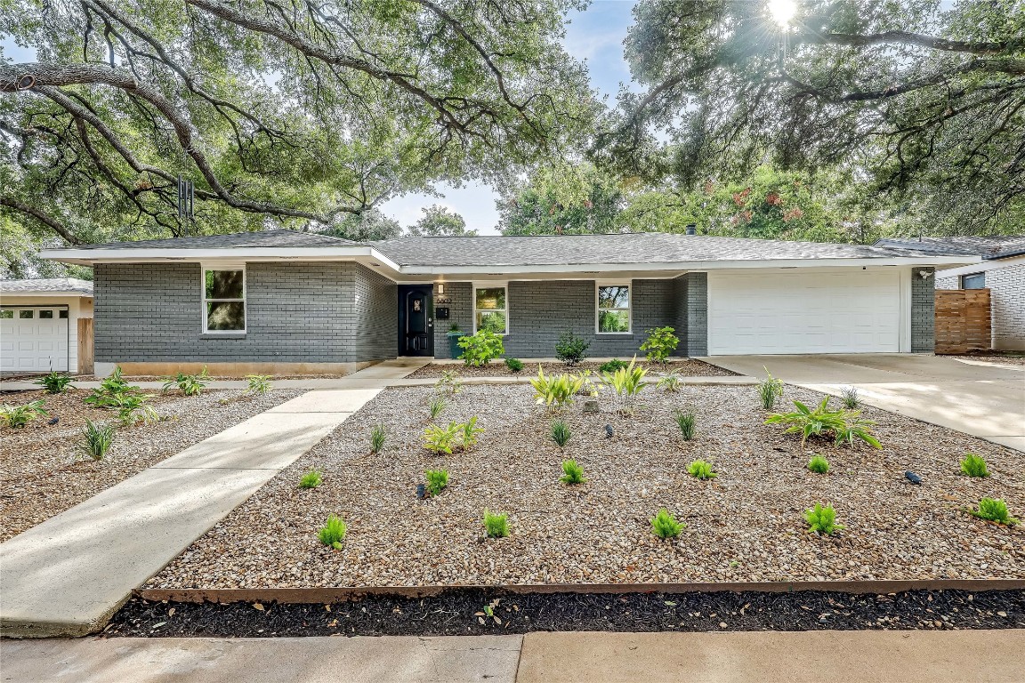 front view of house with a yard