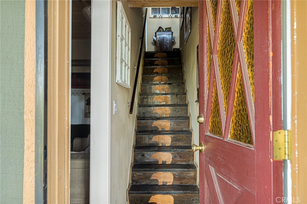2151 Tank Road Running Springs, CA 92382 - Photo 16 of 29 a view of an entryway with stairs