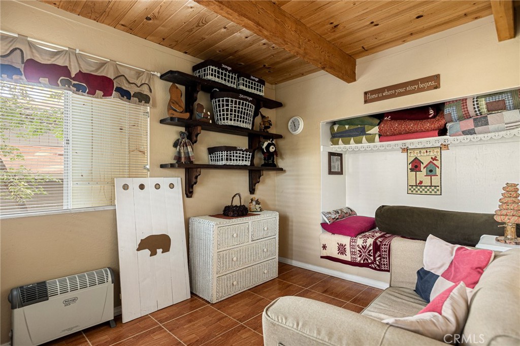 2151 Tank Road Running Springs, CA 92382 - Photo 20 of 29 a living room with furniture and a window