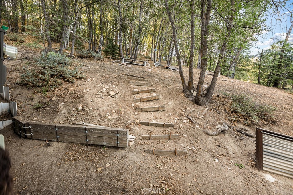 2151 Tank Road Running Springs, CA 92382 - Photo 24 of 29 a view of a backyard of the house