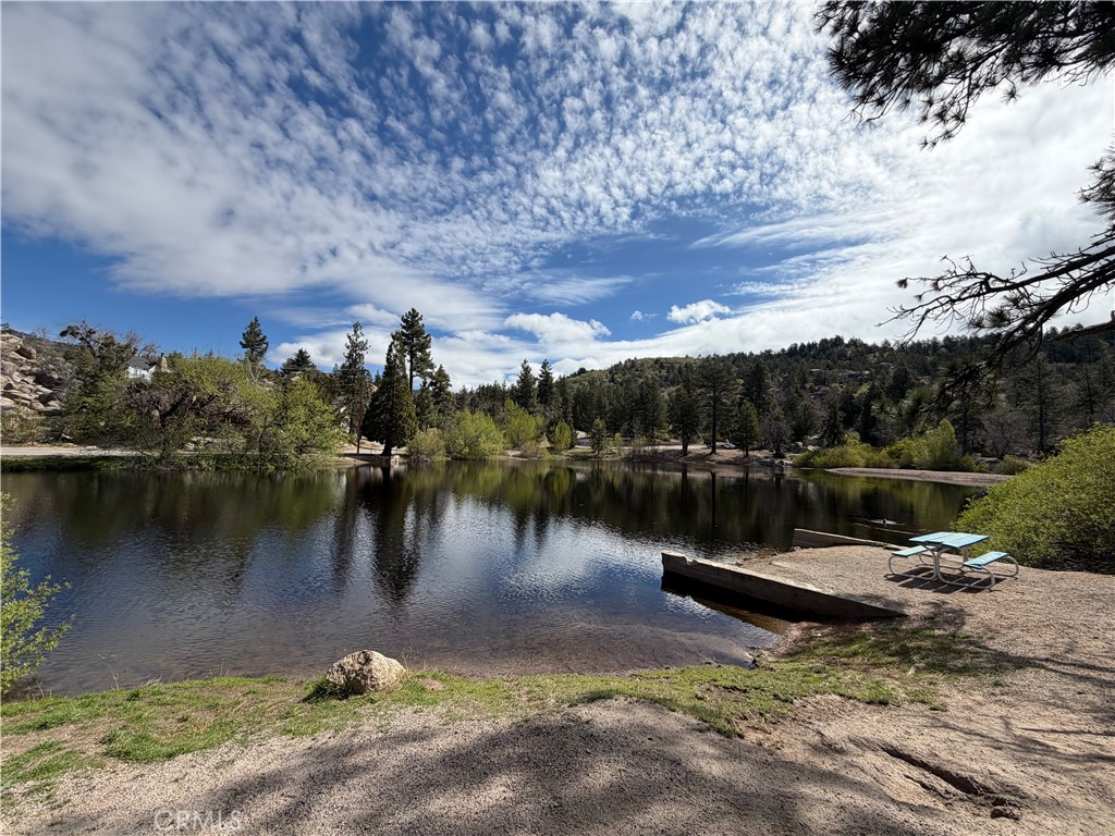 2151 Tank Road Running Springs, CA 92382 - Photo 29 of 29 a view of a lake with houses in the back