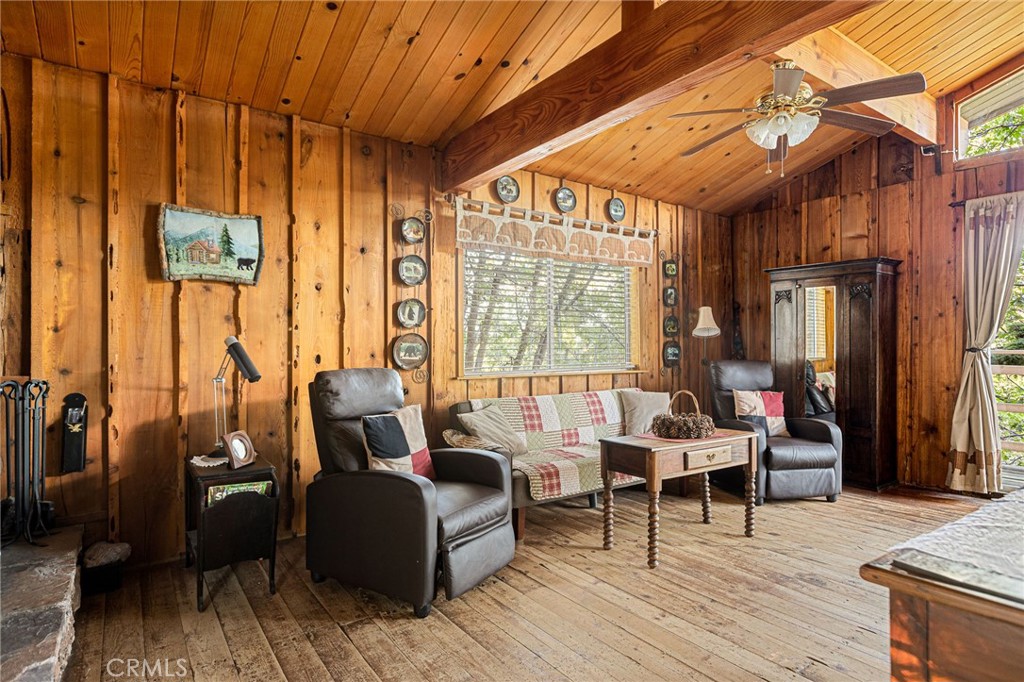 2151 Tank Road Running Springs, CA 92382 - Photo 6 of 29 a living room with furniture a large window