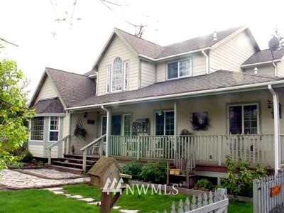 810 Lucas Creek Road Chehalis, WA 98532 - Photo 1 of 1 front view of a house with a yard