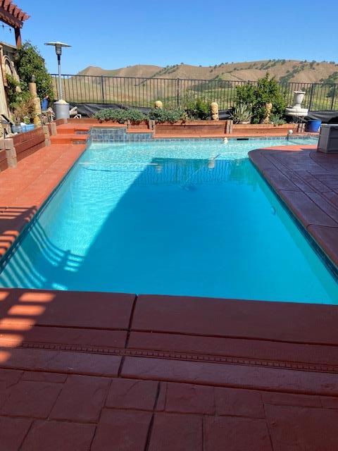 20640 Sarazen Place Patterson, CA 95363 - Photo 7 of 7 a view of swimming pool with a yard