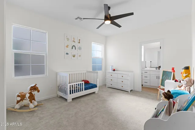 a view of livingroom with furniture and windows