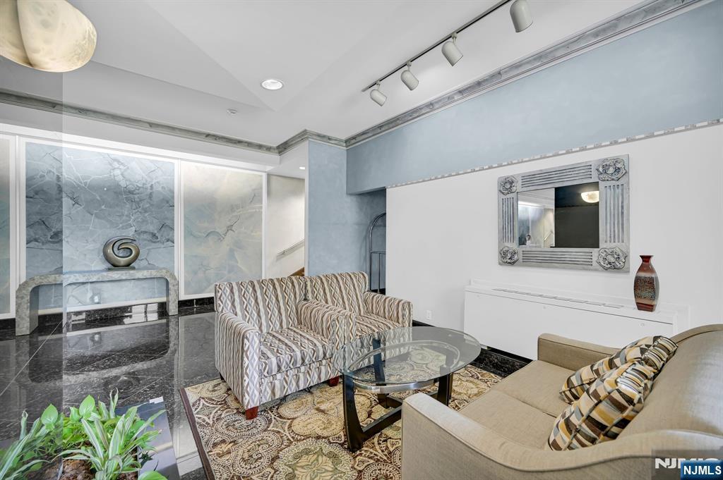 280 Prospect Avenue, Unit 3N Hackensack, NJ 07601 - Photo 4 of 23 a living room with furniture and wooden floor
