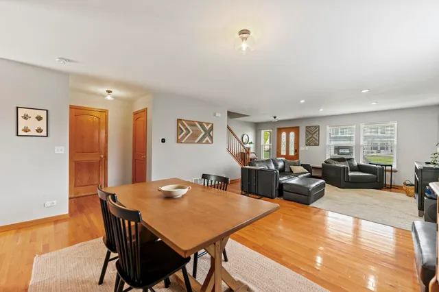 a kitchen with granite countertop stainless steel appliances and wooden cabinets