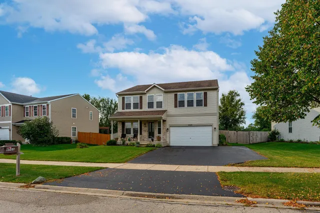 front view of house with a yard