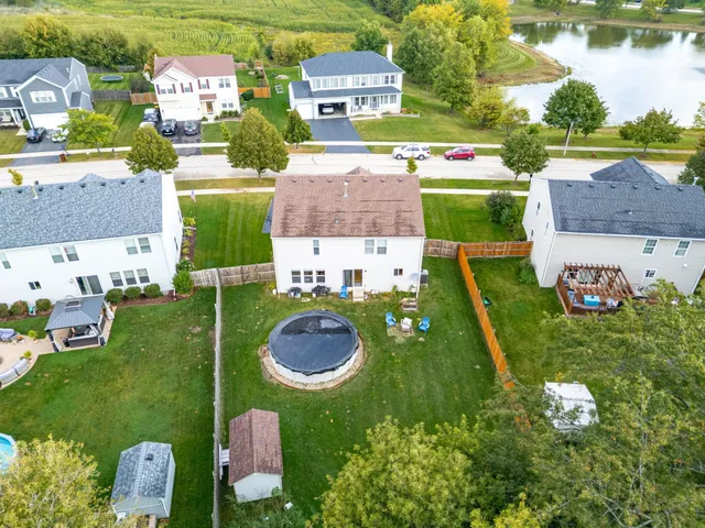 a view of lake with green space