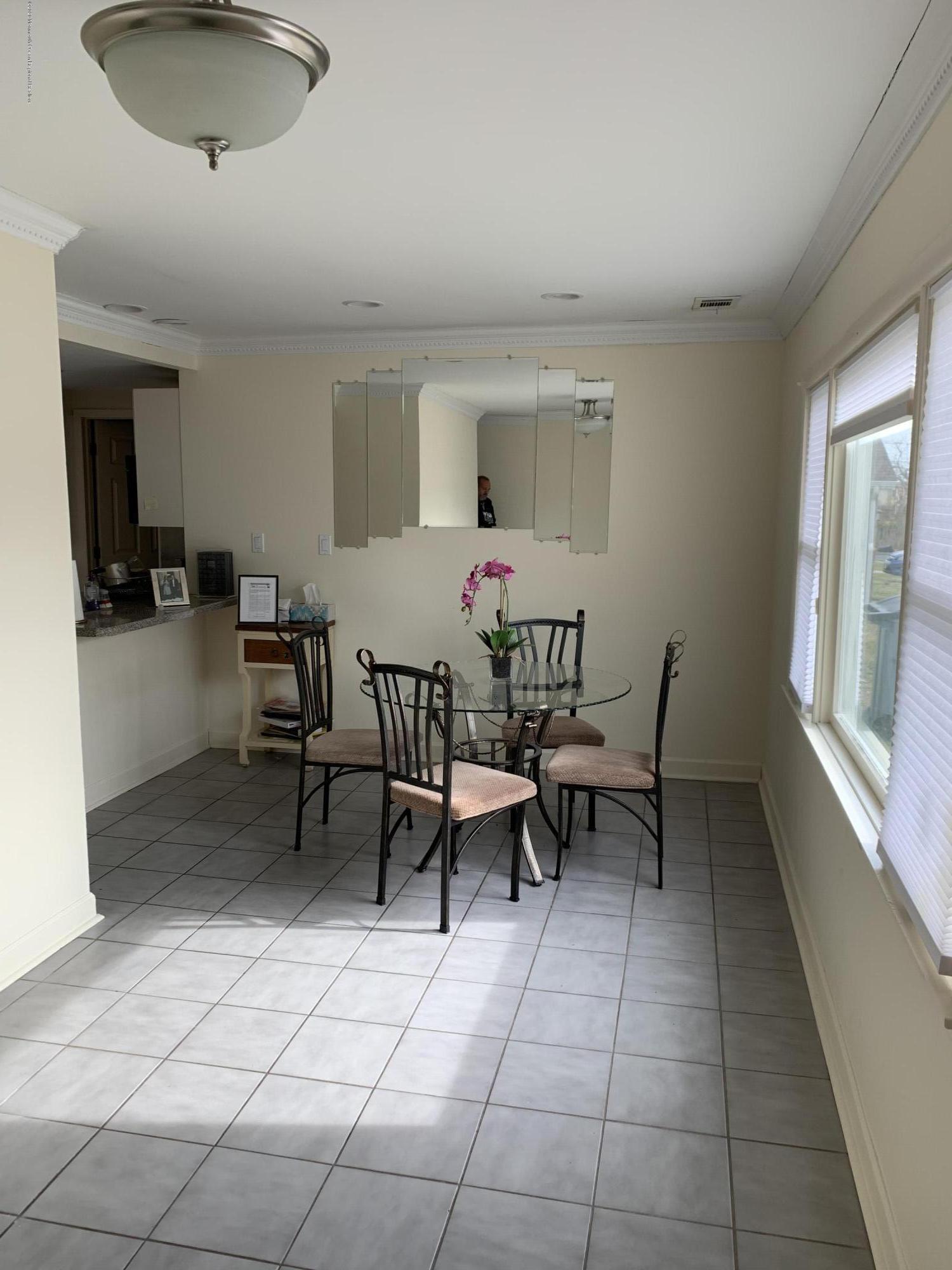 191 Norgrove Avenue Long Branch, NJ 07740 - Photo 2 of 6 a view of a dining room with furniture and a rug