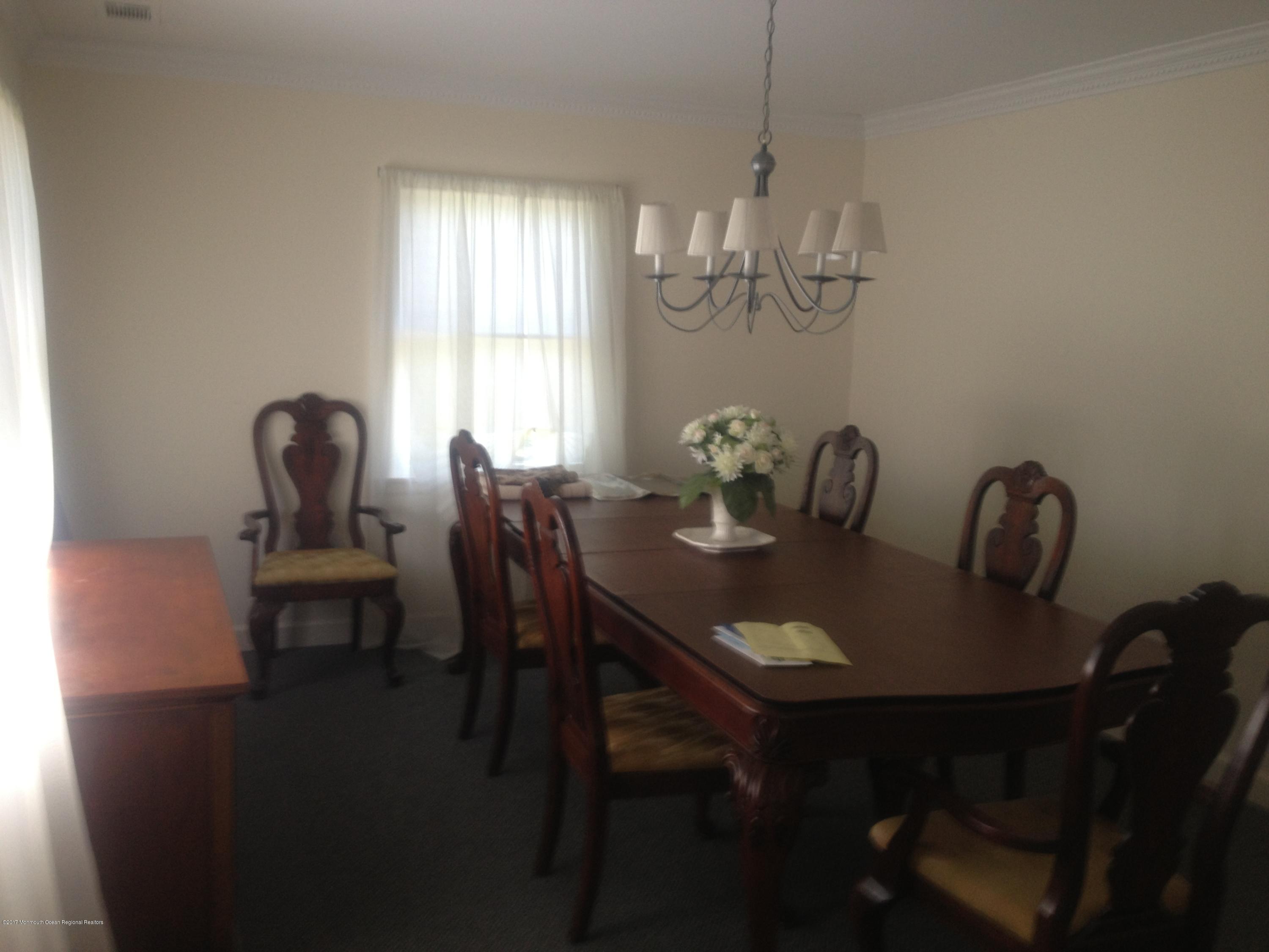 191 Norgrove Avenue Long Branch, NJ 07740 - Photo 3 of 6 a view of a dining room with furniture window and outside view