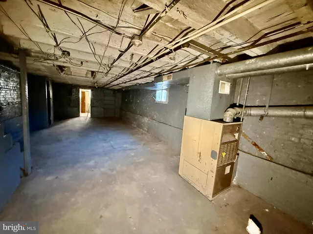 a view of a refrigerator in the room