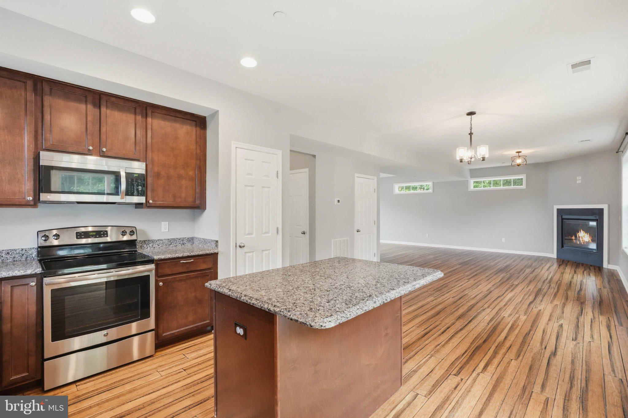 706 Trapper Way Deale, MD 20751 - Photo 17 of 61 Modern kitchen with open layout charm.