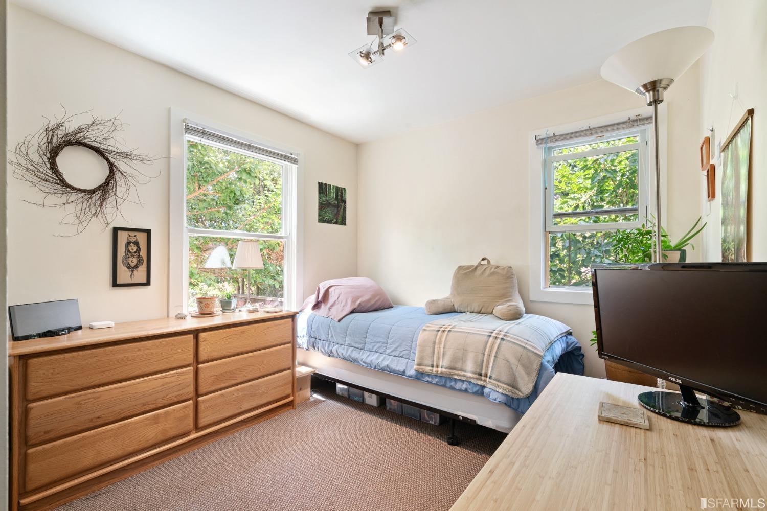 1934 Stuart Street Berkeley, CA 94703 - Photo 18 of 56 a room with a bed and a window