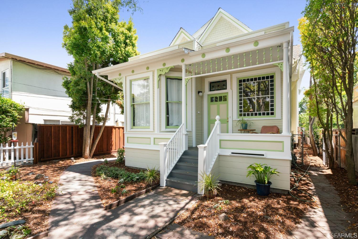1934 Stuart Street Berkeley, CA 94703 - Photo 4 of 56 a front view of a house with a yard