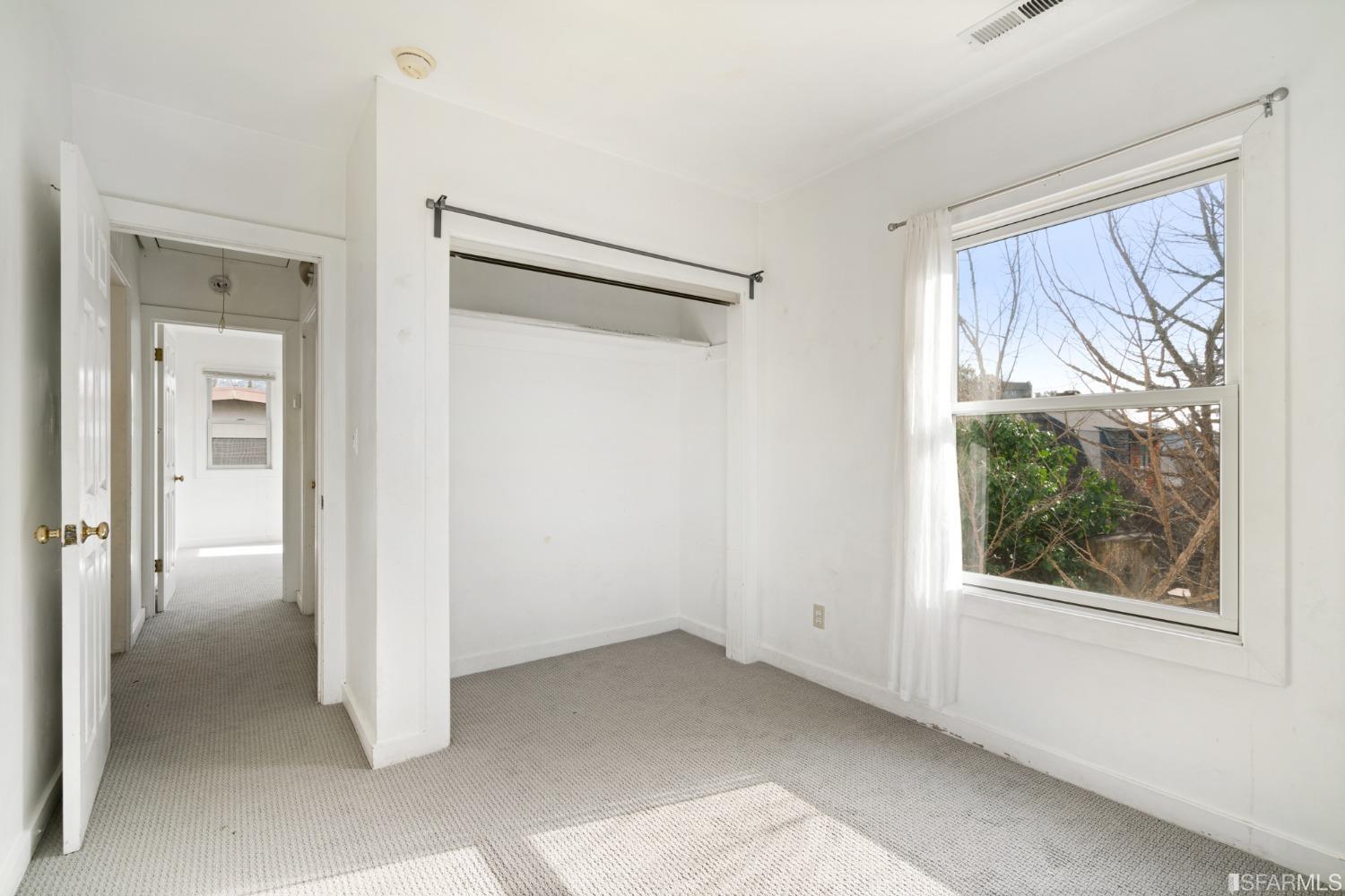 1934 Stuart Street Berkeley, CA 94703 - Photo 45 of 56 a view of an empty room with a window