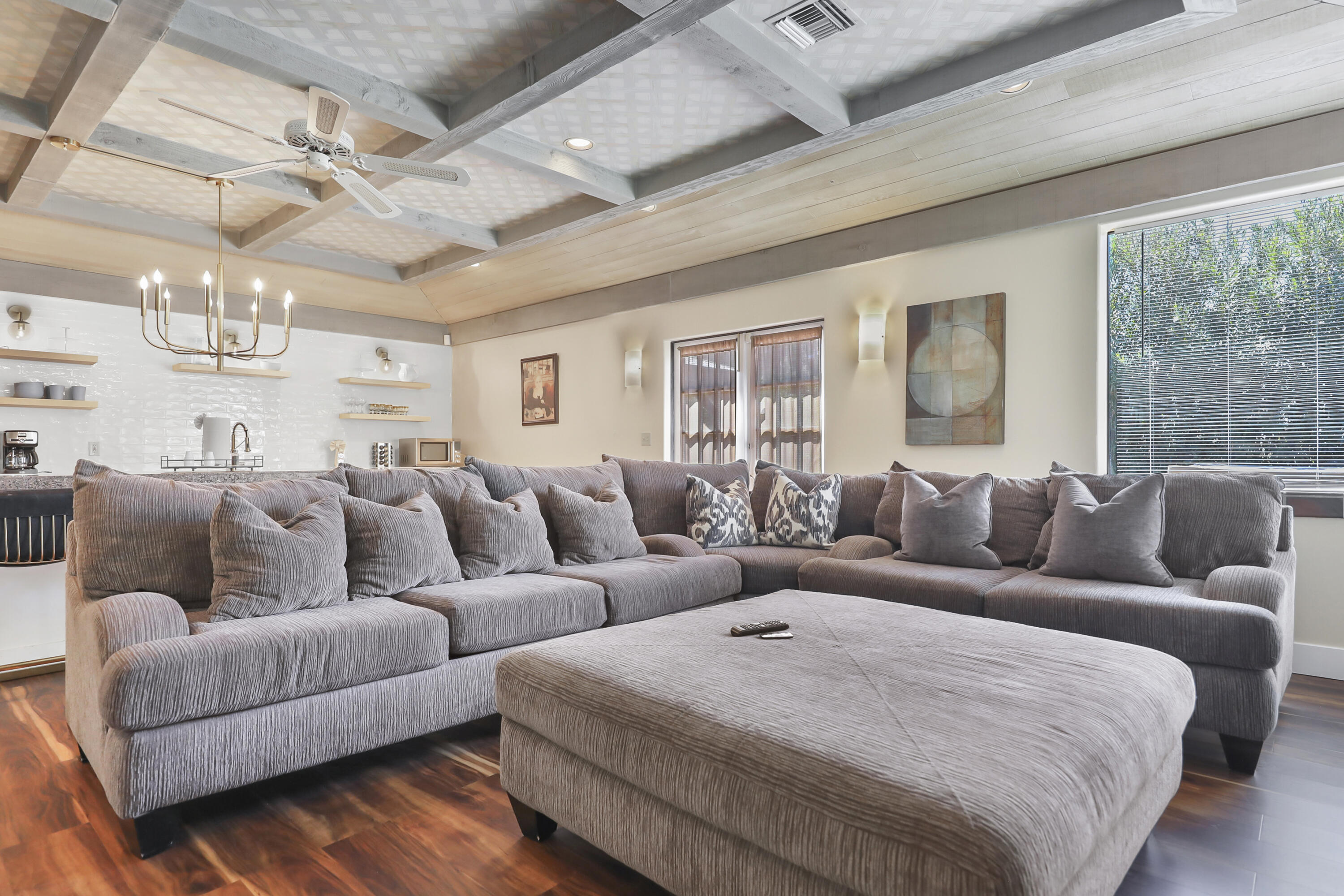 19120 Bubbling Wells Road Desert Hot Springs, CA 92241 - Photo 17 of 45 a living room with furniture and a large window