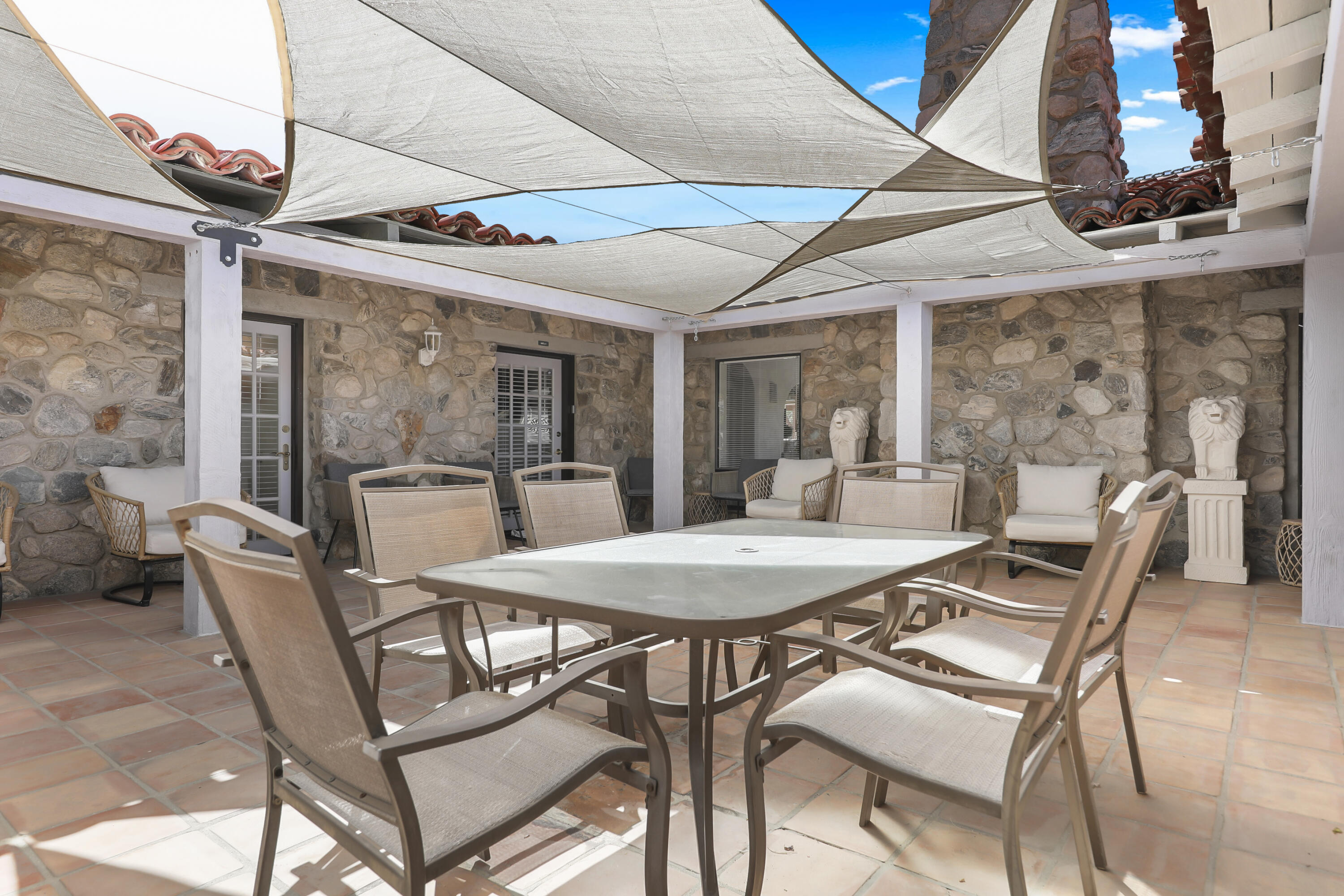 19120 Bubbling Wells Road Desert Hot Springs, CA 92241 - Photo 3 of 45 a dining room with furniture and window