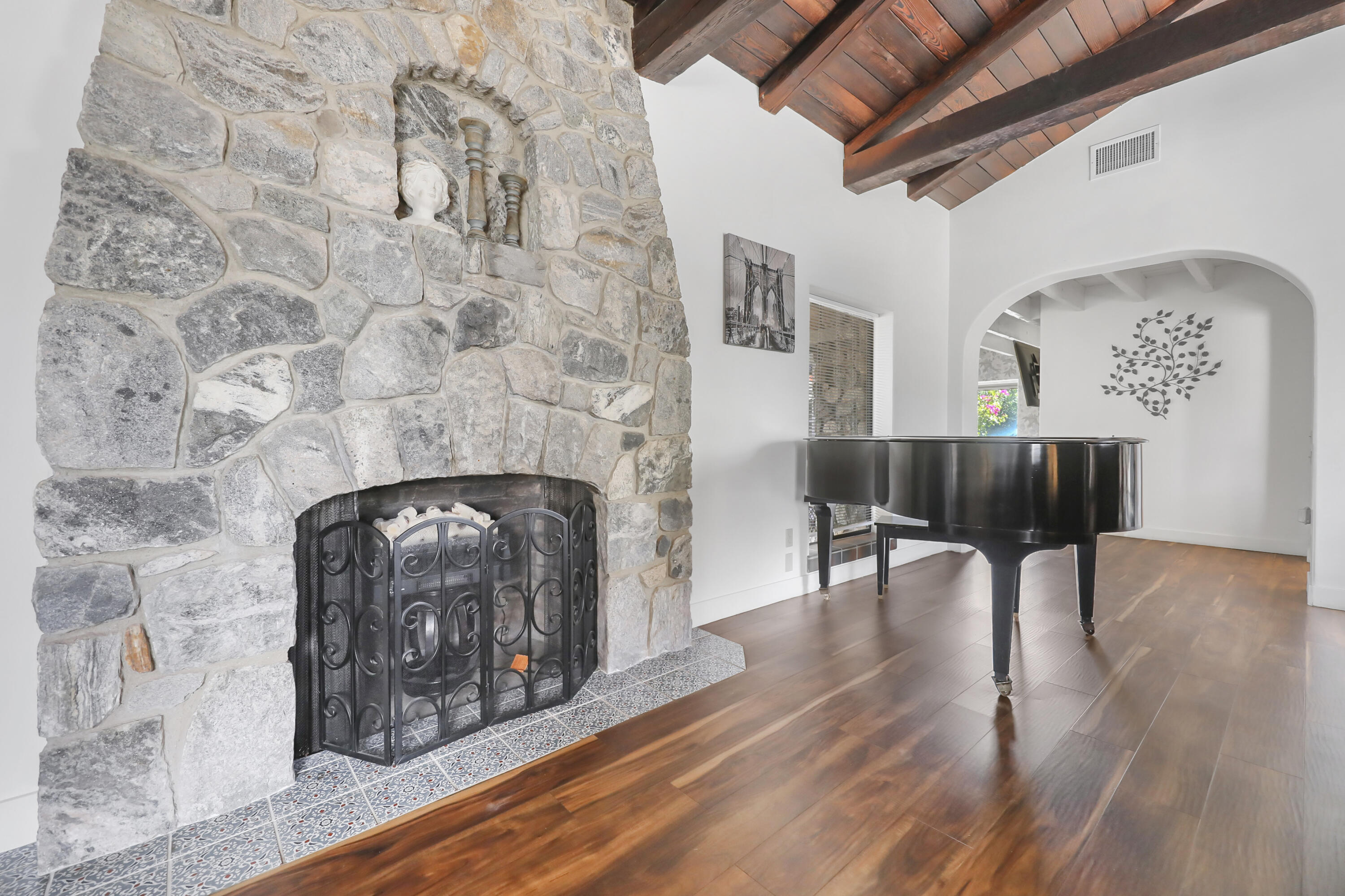 19120 Bubbling Wells Road Desert Hot Springs, CA 92241 - Photo 8 of 45 a living room with furniture and a fireplace