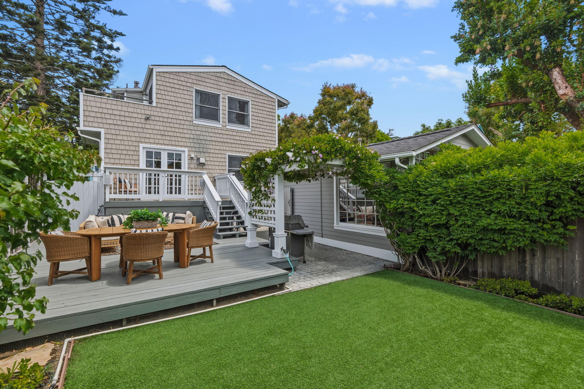 2129 Red Rose Way Santa Barbara, CA 93109 - Photo 1 of 44 a front view of a house with a yard