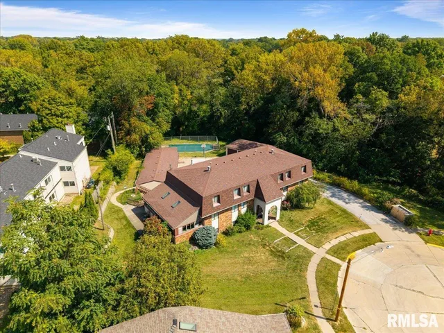 a view of a house with a street
