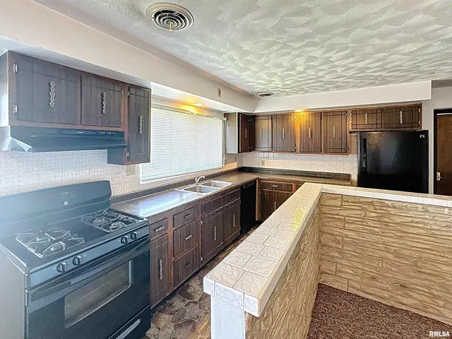 a car parked in front of a house