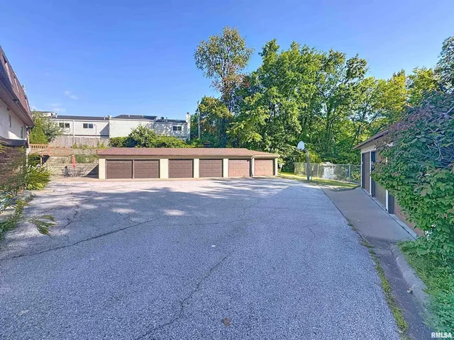 a view of a dining room kitchen with furniture and wooden floor