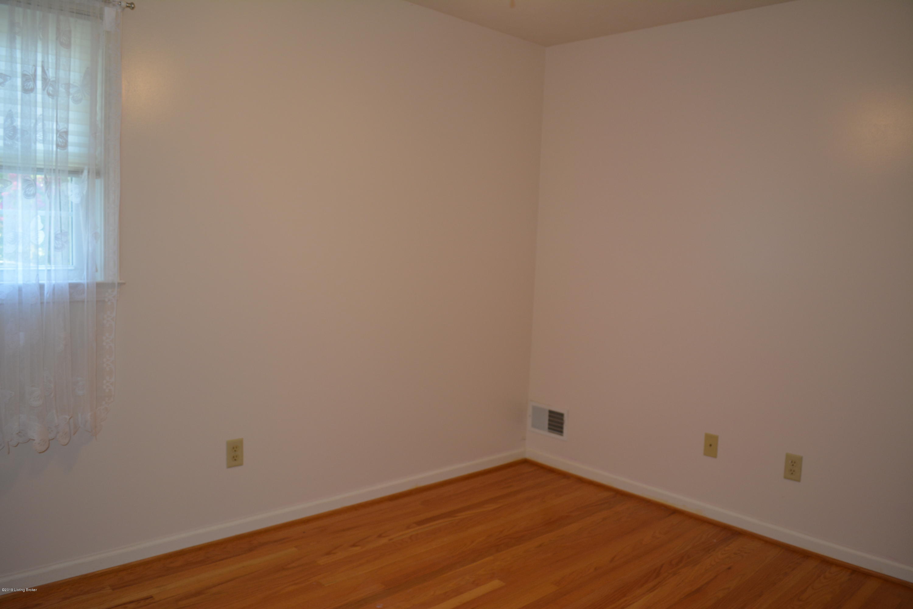 8223 Delido Road Louisville, KY 40219 - Photo 30 of 64 Same bedroom on main floor empty and ready for your belongings.