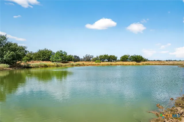 a view of a lake with a city