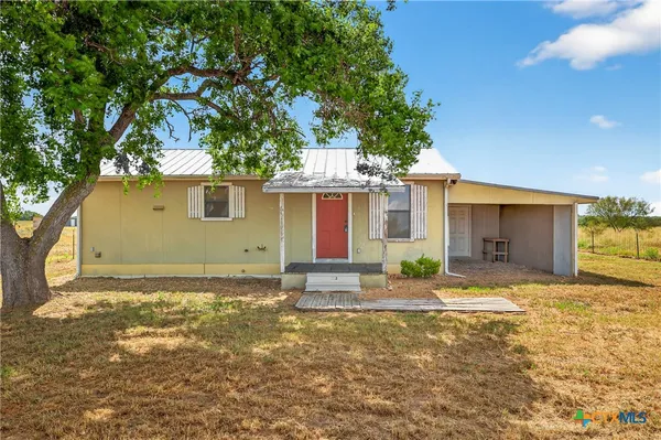a front view of house with yard