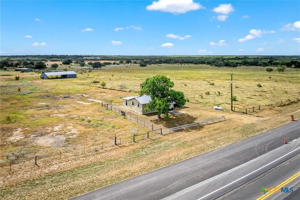 a view of an ocean and city