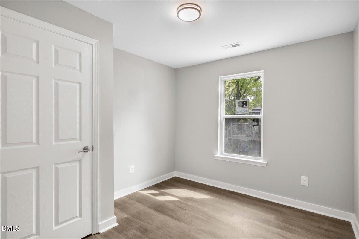 509 Sparella Street Durham, NC 27703 - Photo 25 of 30 an empty room with windows
